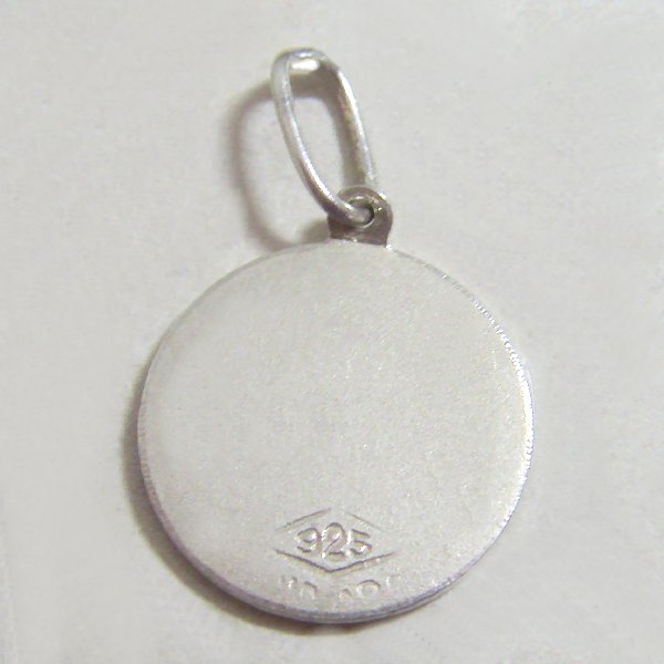 (p1093)Medalla de plata motivo Virgen Nia.